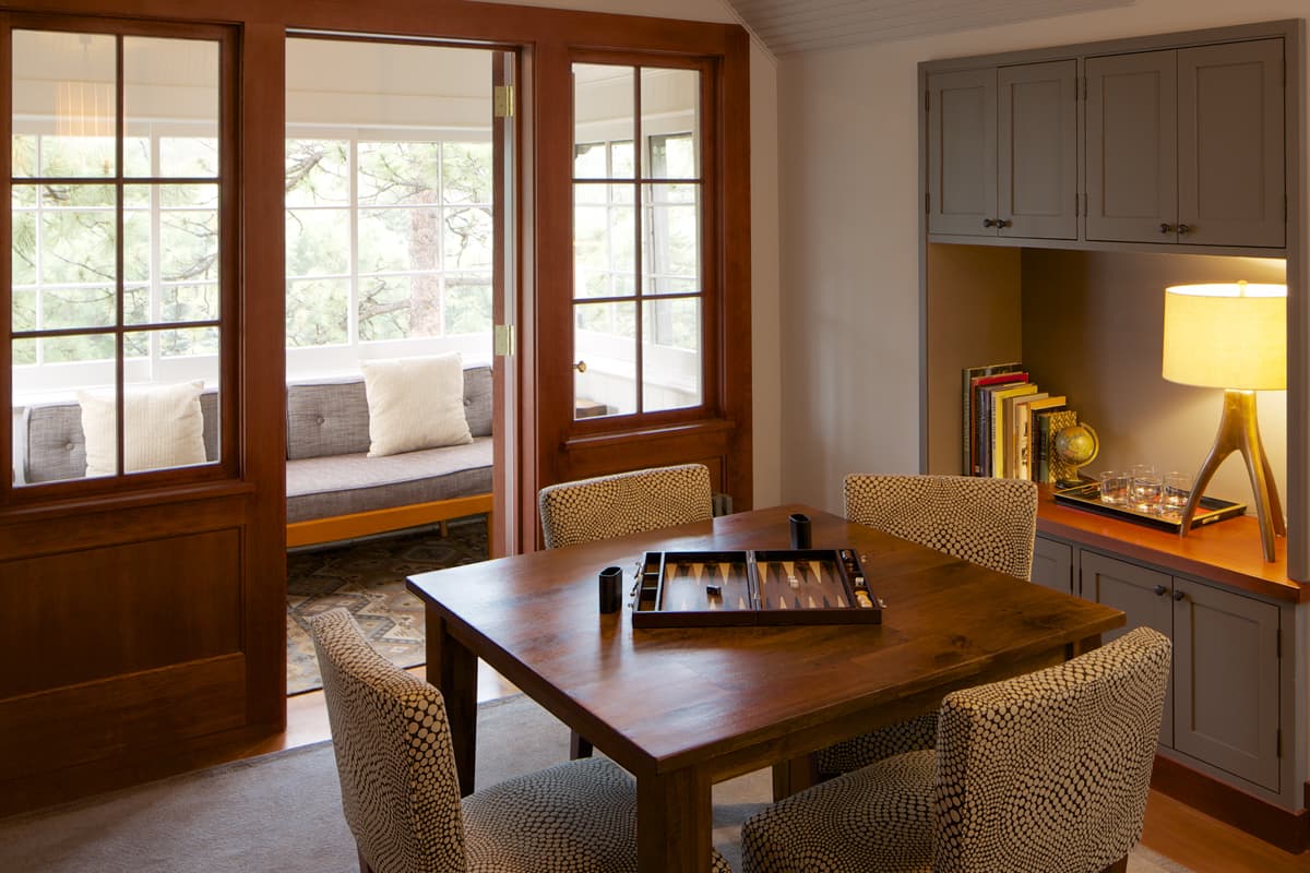 This common area is set up for a group game. A second sitting area allows gets to chat and catch up on adventures.