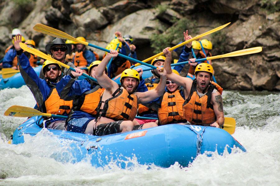 A group of people on a whitewater raft on Clear Creek near Idaho Springs, Colorado