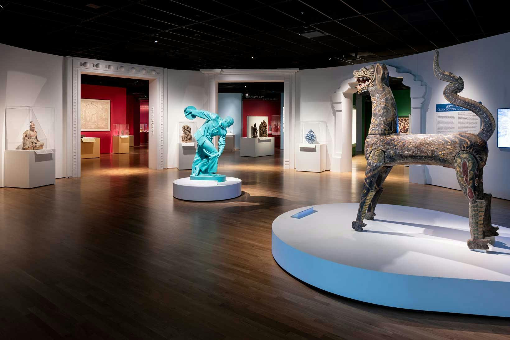 Asian statues on display at an art museum