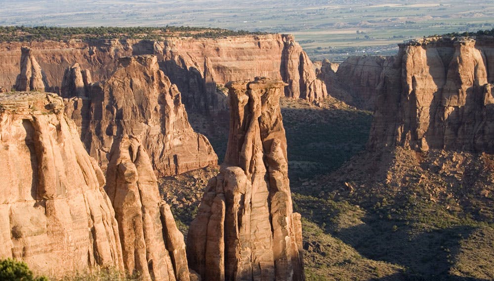 Soaring red-sandstone spires rise from the canyon floor