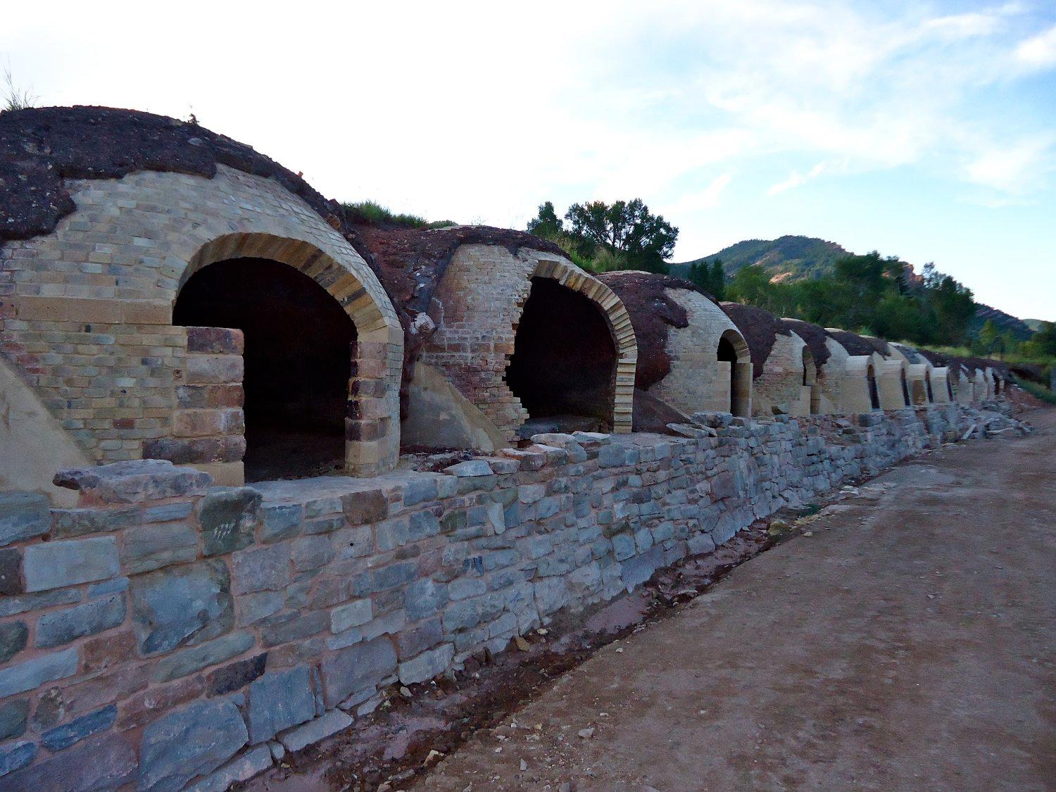 A close-up of the Redstone Coke Ovens with a mountain in the background.