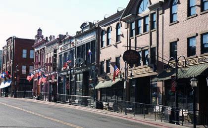 Victorian-era brick buildings with awnings line Cripple Creek's main street