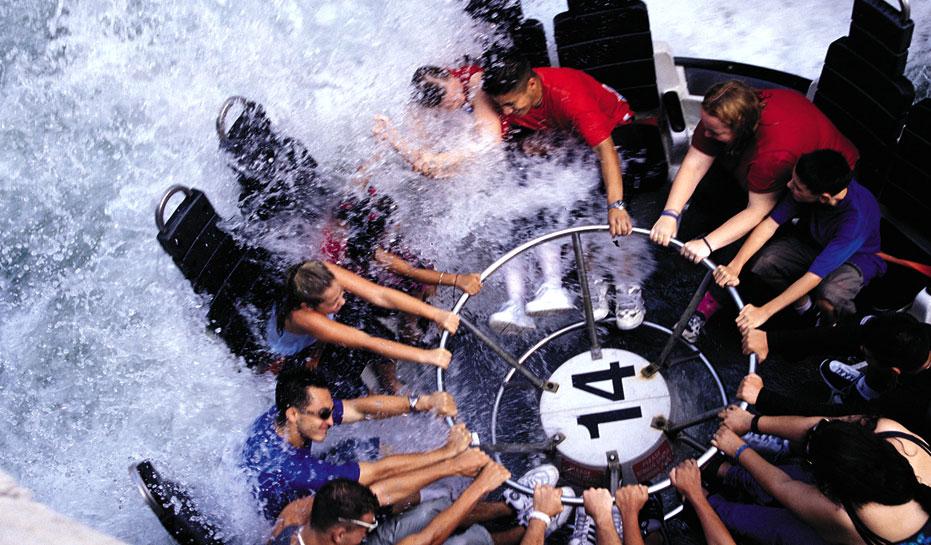 People splash through a water ride at Denver's amusement park, Elitch Gardens