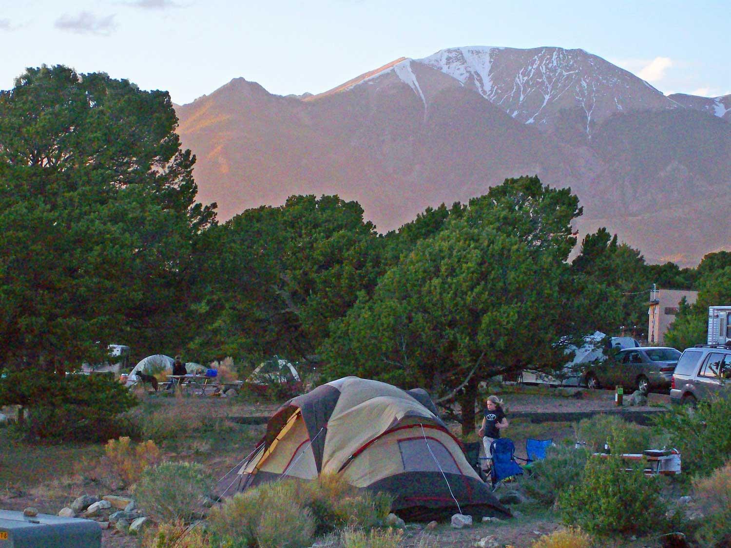 tents at a campground with massive mountains in the background at Great Sand Dunes National Park and Preserve