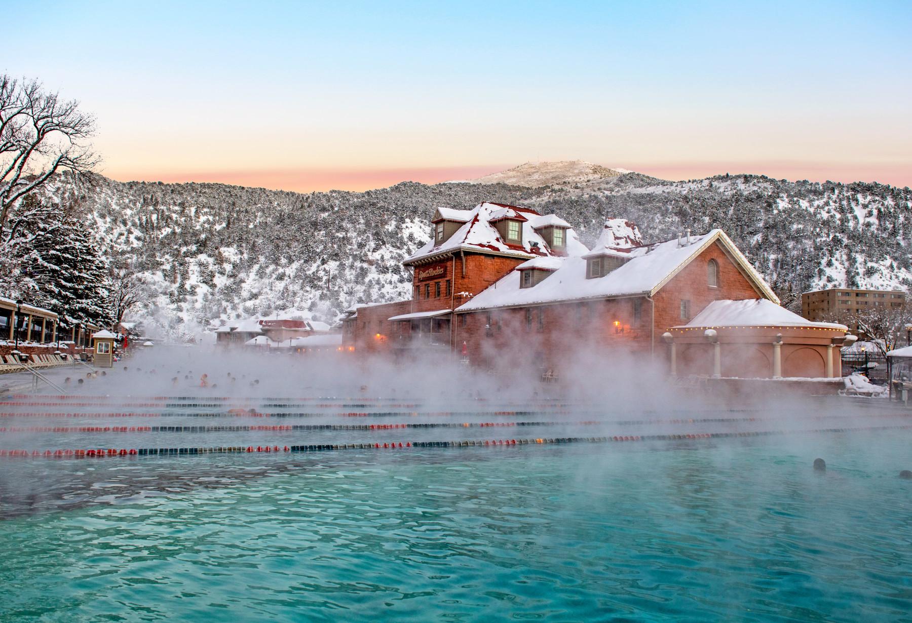 steam rising off the naturally heated mineral waters of our big pool. photo 14