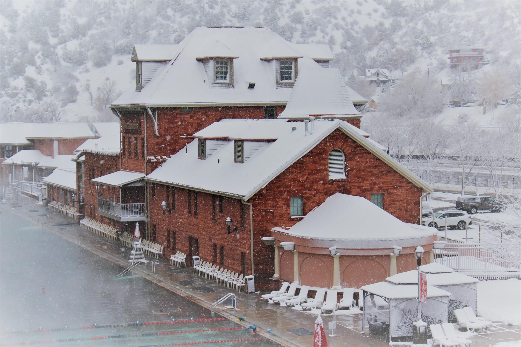 snow falling on the historic original bathhouse built in 1888. photo 18