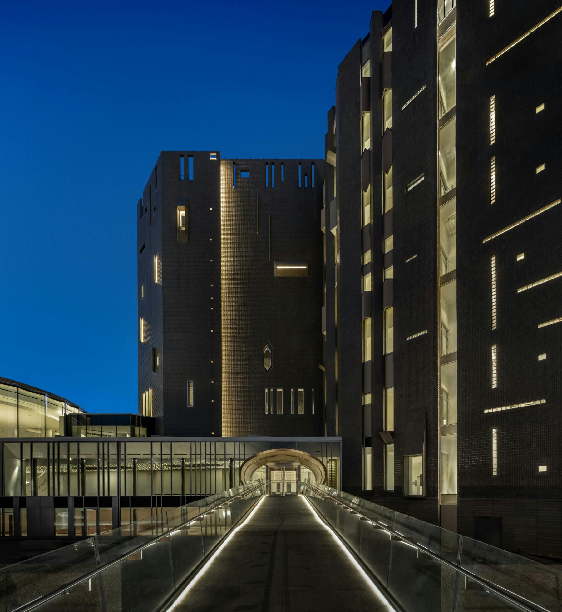 nighttime view of denver art museum's martin building photo 8