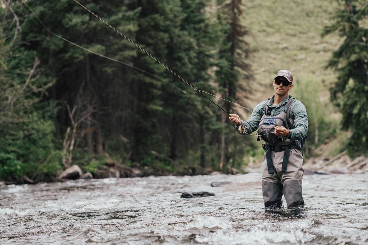 fly-fishing on a peaceful day in calm waters at Vista Verde Ranch in Colorado