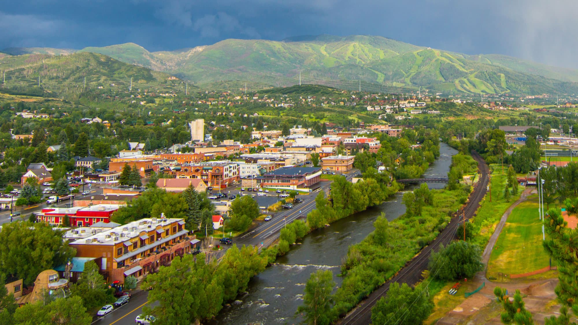Aerial view of Steamboat Springs with Sweeping Mountain Background