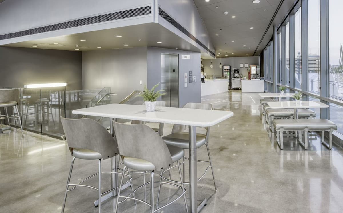 Silver tables and chairs at the Flame Café at the US Olympic & Paralympic Museum in Colorado Springs