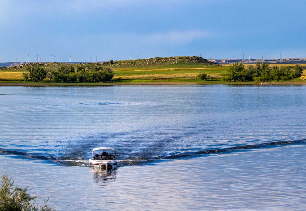 A boat heads for the shore at North Sterling State Park