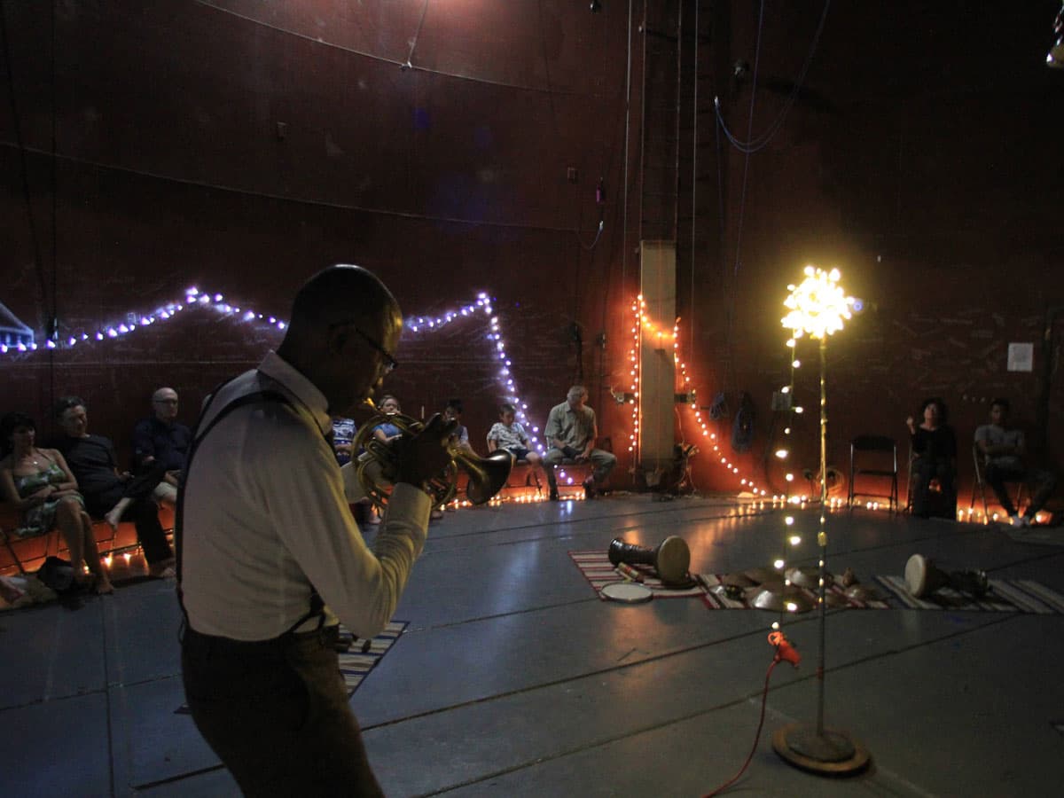 Jazz musician Ron Miles performs at Rangely's TANK Center for Sonic Arts at night