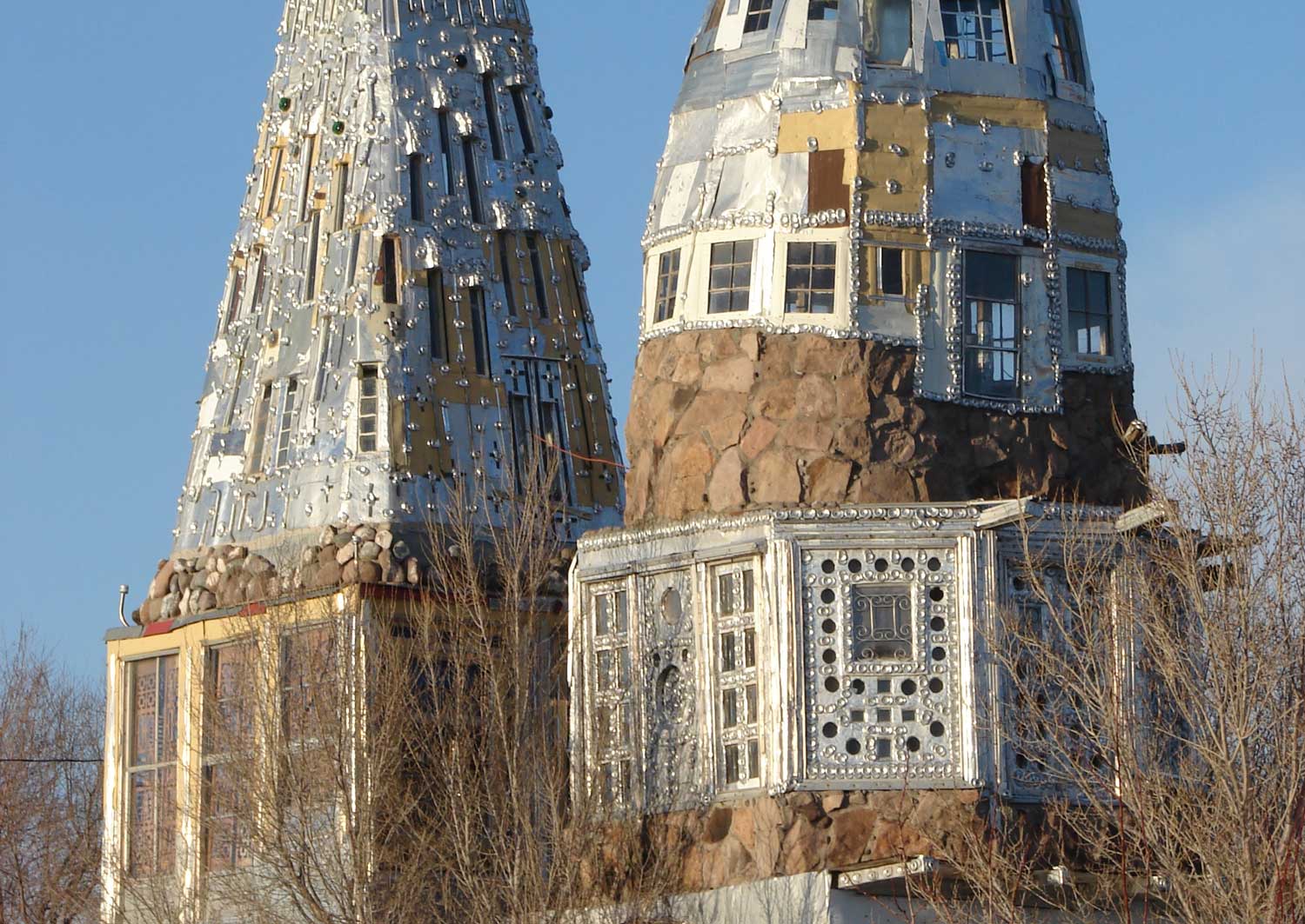 Built of beer cans and scrap metal, Cano's Castle stands on a clear-blue day