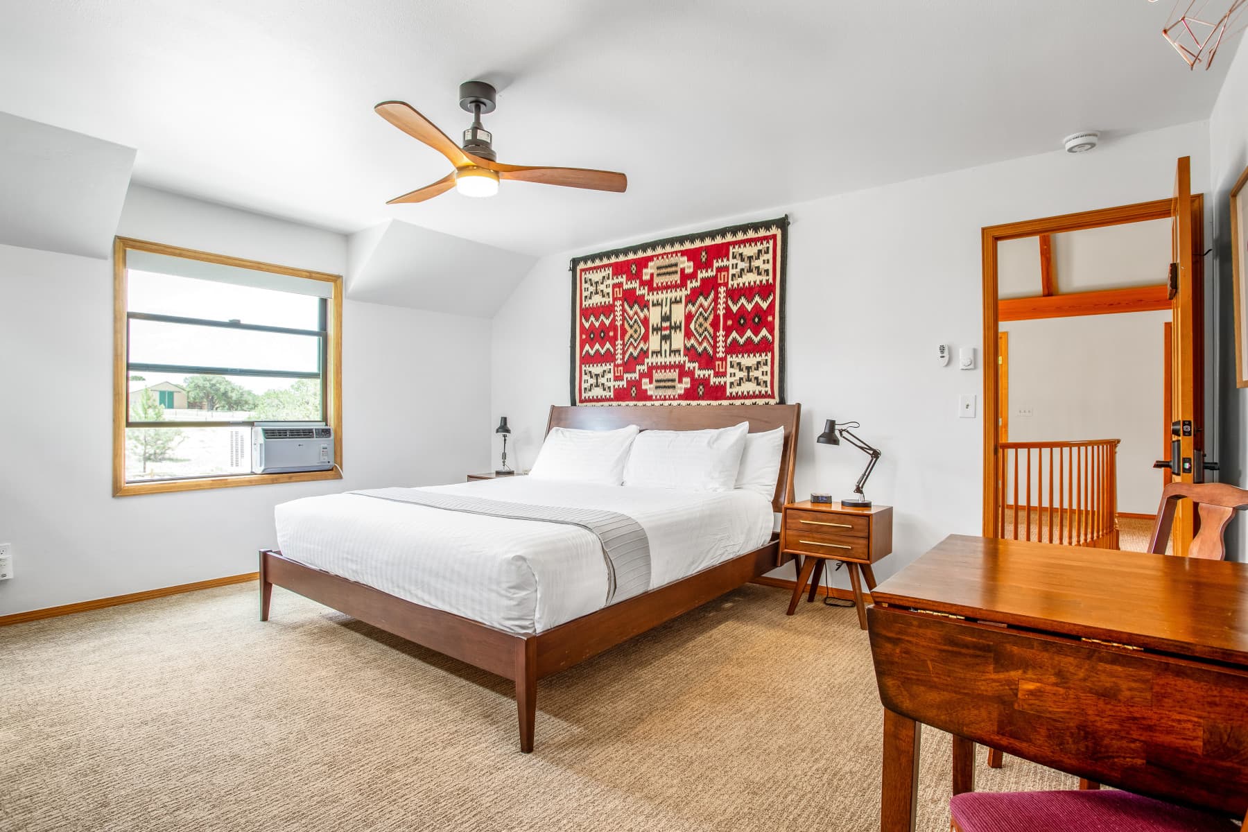 our lodge features six hotel-style rooms, including the rancher suite, pictured.  photo 2