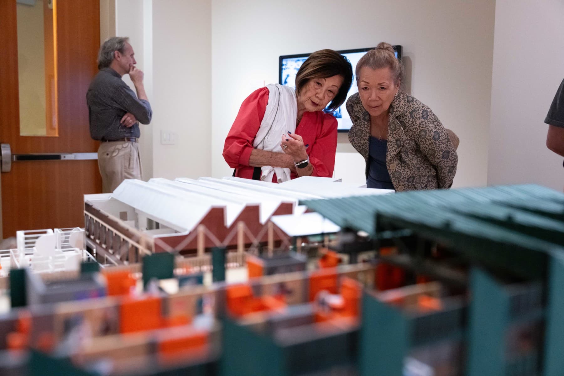 patrons observe the exhibition where is denver's chinatown? photo 6