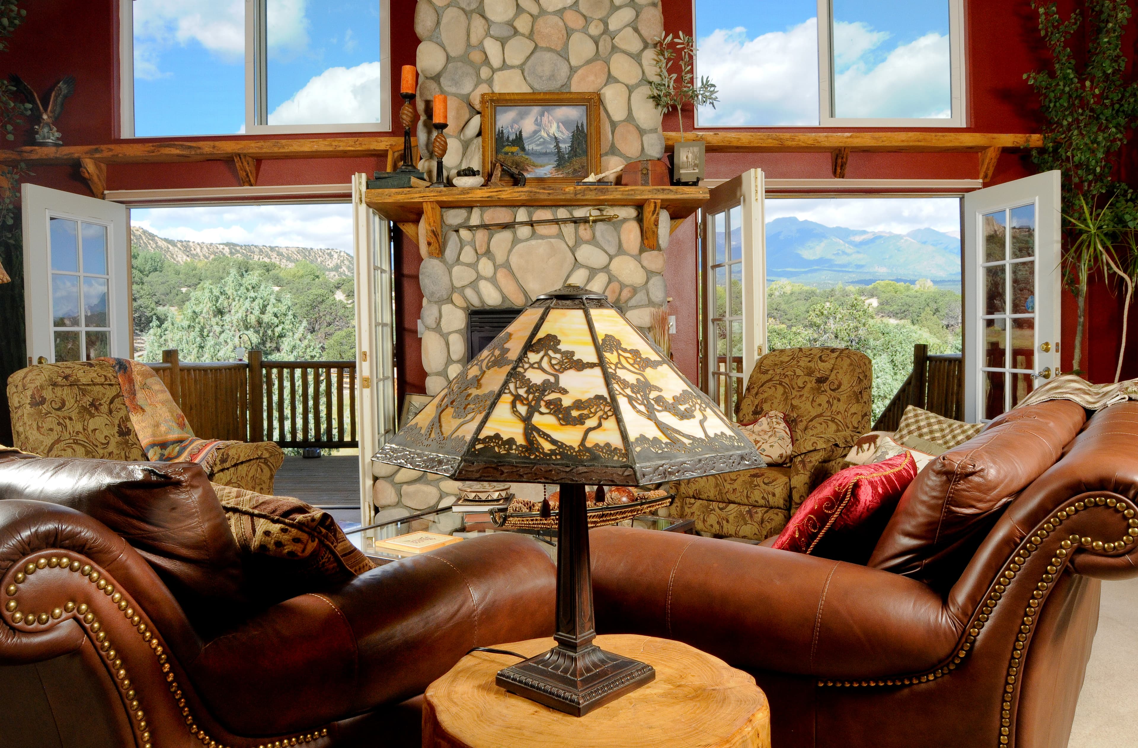 out great room with 2 story fireplace and west facing view. photo