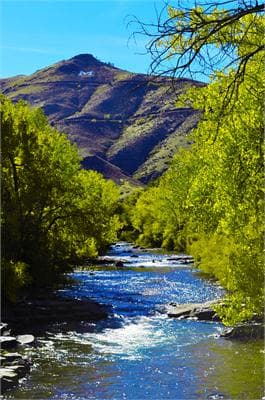 lookout mountain with clear creek in foreground, golden co photo