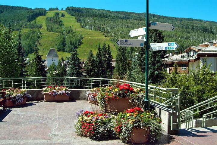 vail mountain and clock tower photo