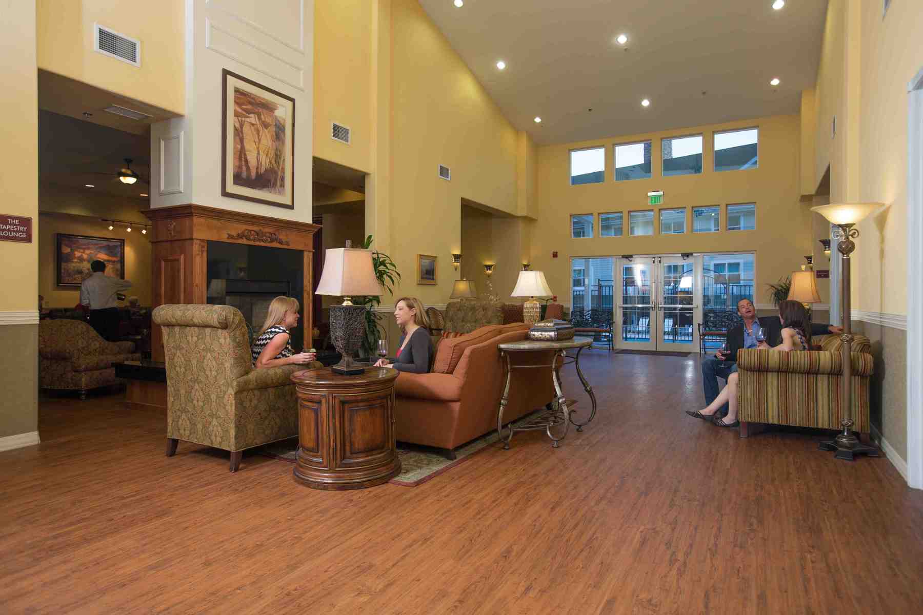 the cozy fireplace welcomes guests in the inn's spacious lobby. photo 4